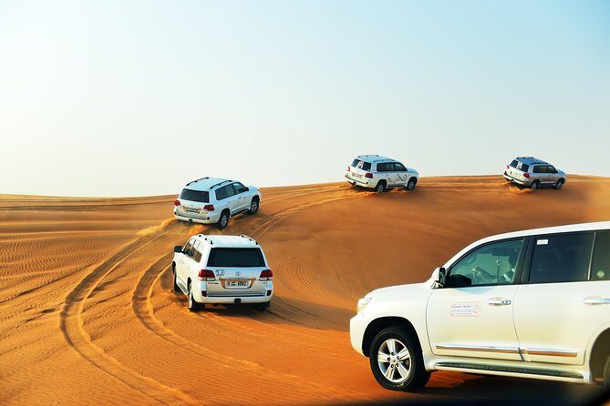 Ras Al-Khaimah: Desert Safari Fun & Adventure Trip with Dinner - Bedouin camp time: camel ride, sandboarding, henna, and more