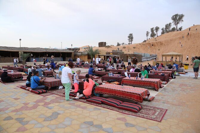 Ras Al Khaimah Desert Safari with Dune Bashing, Belly Dance and BBQ Dinner - The desert ride: 4-wheel-drive dune bashing and sand boarding