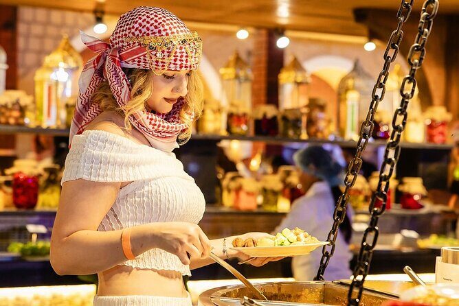 Red Desert Safari With Camel Ride & Sand Skiing - Camel Ride and Sunset: Classic Desert Moments (But Plan for Short Time)