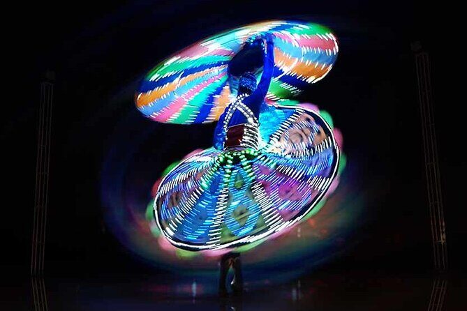 Red Dune Desert Safari Dubai - Entertainment that keeps pace: belly dance, Tanura, and fire show