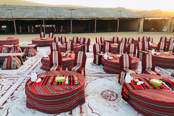 Red Dune Desert Safari Dubai Camel Ride Sandboarding & BBQ Dinner - Live Shows at Night: Tanura, Belly Dance, and Fire