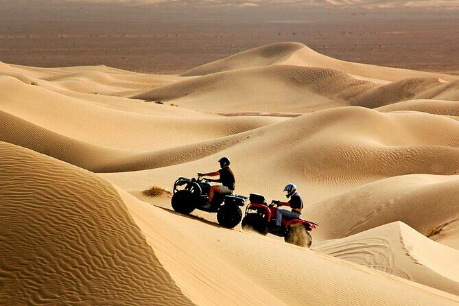 Red Dune Desert Safari Tour with Camel Ride & BBQ Experience - Henna tattoos and photo stops: small souvenir, big payoff
