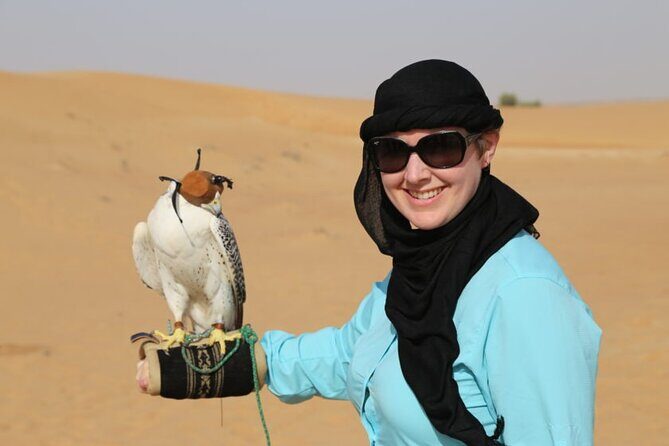 Red Dune Desert Safari with Dinner Quad Bike and Camel Ride - Sandboarding, camel riding, and the camp extras that add texture