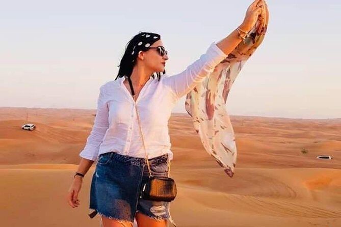 Red Dune Desert Safari With Quad Bike - Camel ride, henna, Arabic dress photos, and apple-flavor sheesha