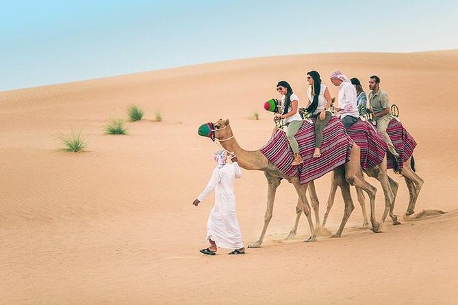Red Dune Safari with Quad Bike Sand Boarding and Camel Ride - Stop 2: more dune time and the action-to-photo rhythm