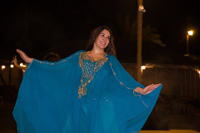 Red Dunes by Quad Bike with VIP Camp, Camels, Sandboarding & Falcon - VIP Desert Camp: Camel Ride, Henna for Ladies, Shisha, Falcon Photos, and Attire Makeovers