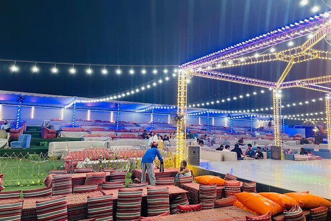 Red Dunes Desert Safari Dubai with Dinner Buffet, Show & Transfer - Camp Time at Safari Desert Dubai: Camel Ride, Sand Boarding, and Henna