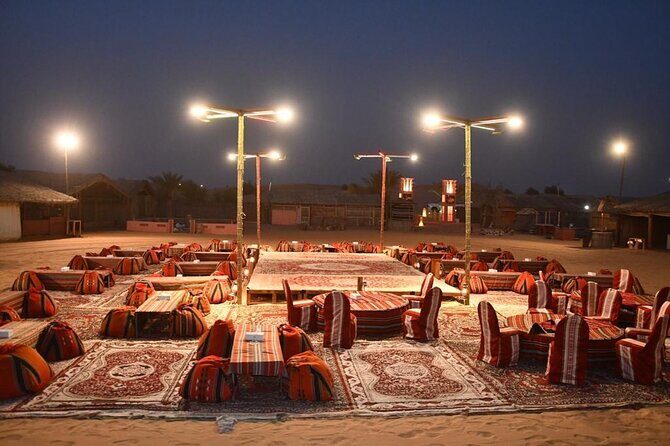 Red Dunes Desert Safari with BBQ Dinner - Desert camp welcome: tea, henna, and your short camel ride