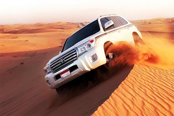 Red Dunes Desert Safari with BBQ Dinner, Camel Riding & Live Show - 4x4 dune bashing: the part people remember
