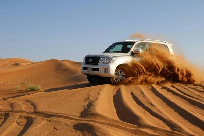 Red Dunes Dubai Desert Safari with Live show, Sandboarding & BBQ - 4x4 dune bashing and sandboarding: the adrenaline portion