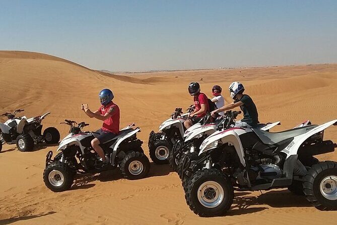 Red Dunes Lahbab Safari with BBQ Dinner and Quad Bike - BBQ dinner and live shows: where the pace slows into fun
