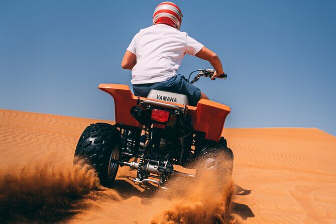 Red Dunes Quad Bike Safari, Sand surf, Camels and BBQ - Camp welcome: gahwa coffee, dates, and a calm landing