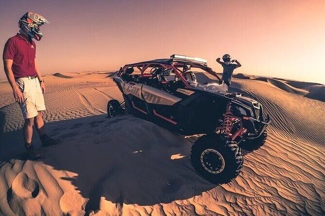 Red Sand desert safari with Quadbike option - Camel ride + the 4x4 dune bashing run (where people feel it)