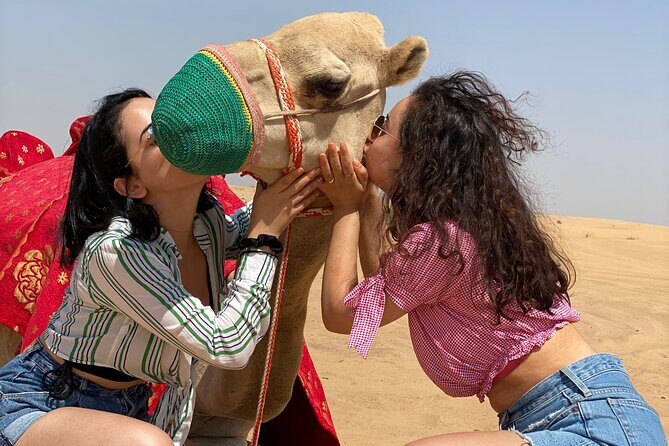 Self Drive Quad Bike in Open Desert With Sand Boarding and Camels - Sandboarding After Quad Biking: Expect a Fun Learning Curve