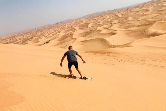 Self Drive Quad Bike in Open Desert With Sand Boarding and Camels - Pickup, Drop-Off, and the 4-Hour Time Window