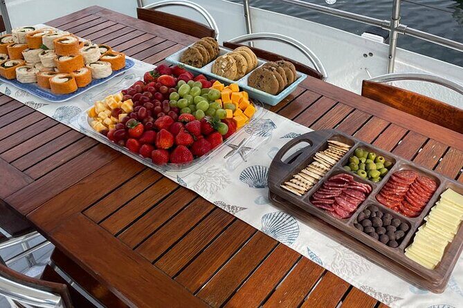 Shared Yacht Tour in Dubai Marina - Food, snacks, and music: what you might get depending on your option