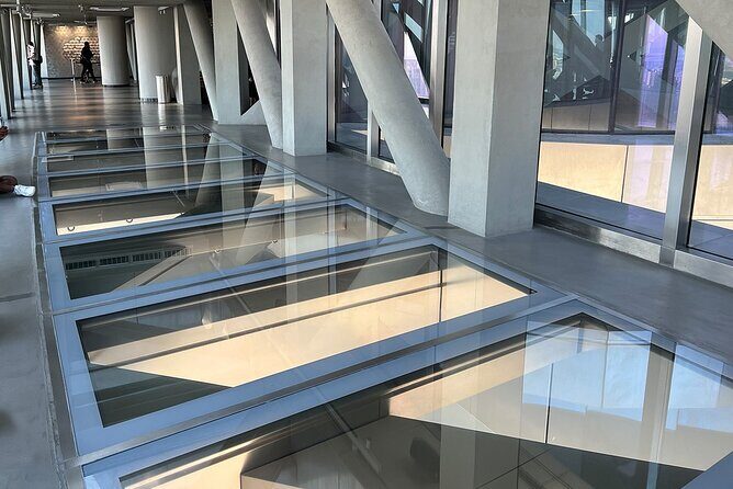 Sky Views Dubai - Panoramic elevator, glass walls, and the 25-meter glass floor at 219.5m