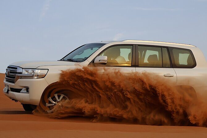 Starlight Serenade with Gourmet Dinner and Entertainment - Dune Bashing, Sandboarding, and Camel Rides (All Included)