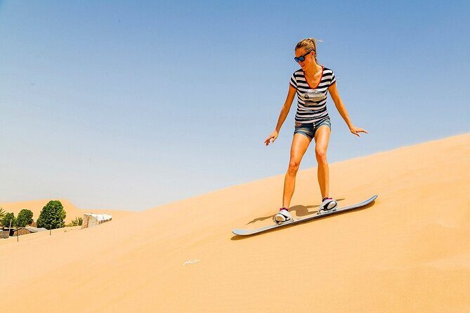 Sundowner Dune Safari With Dinner - Camel ride, sand boarding, and henna at the camp