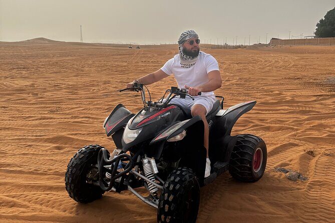 Sunrise Desert safari With Quad bike ride Sandboard & Camel ride - Dune bashing for 30 minutes: the guided adrenaline