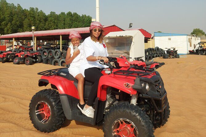 Sunrise Desert safari With Quad bike ride Sandboard & Camel ride - Camel ride for 15 minutes: scenic, not a marathon