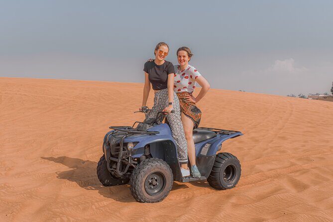 Sunrise Desert safari With Quad bike ride Sandboard & Camel ride - Pickup and Land Cruiser comfort from Dubai or Sharjah