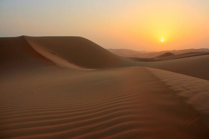 Sunrise Desert Safari with Quad Biking and Camel Riding in Dubai - Sandboarding: an optional add-on you can decide on quickly