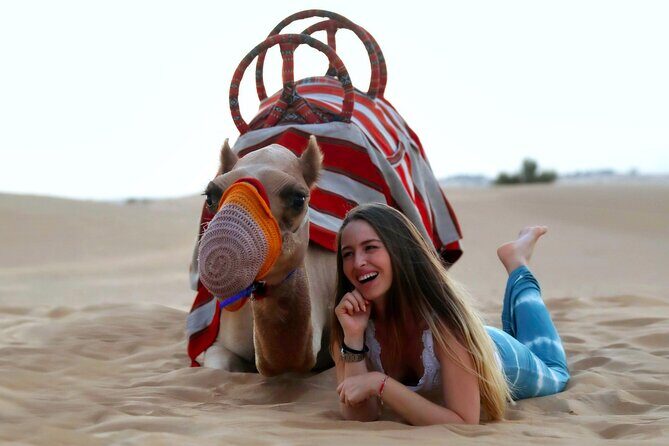 Sunset Camel Trek & Red Dunes Safari with BBQ at Al Khayma Camp From Dubai - Camel trek and sand activities: what you get beyond the photos
