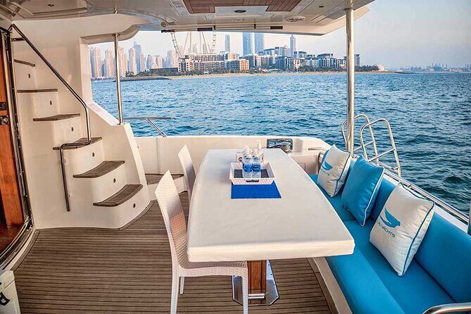 Sunset escape on Bluemoon 64ft from Dubai Marina to Atlantis - Food, snacks, and onboard extras (including fishing and BBQ add-ons)