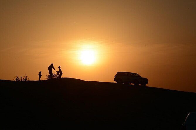 Sunset Evening Safari,Camel ride,live shows and BBQ Dinner with No Hidden Charge - Door-to-dunes comfort: the 4×4 luxury SUV pickup