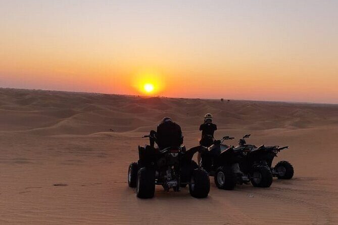 Sunset Quad Bike Safari With Camel Trek, Live Shows and Dinner - Why sunset quad biking feels different in Dubai’s red dunes