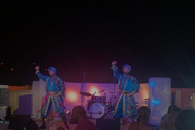 Sunset Safari with BBQ at Al Hadheerah Bab Al Shams Desert Resort - Entertainment Highlights: Dancers, Bands, Falconry Display, Fireworks