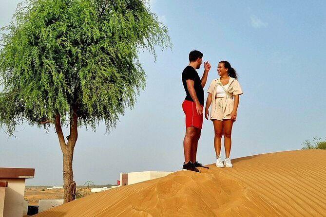 The Ghost Village Safari Tour with Dune Bashing and Sandboarding - Sandboarding and the camel ride: included fun, with different energy levels