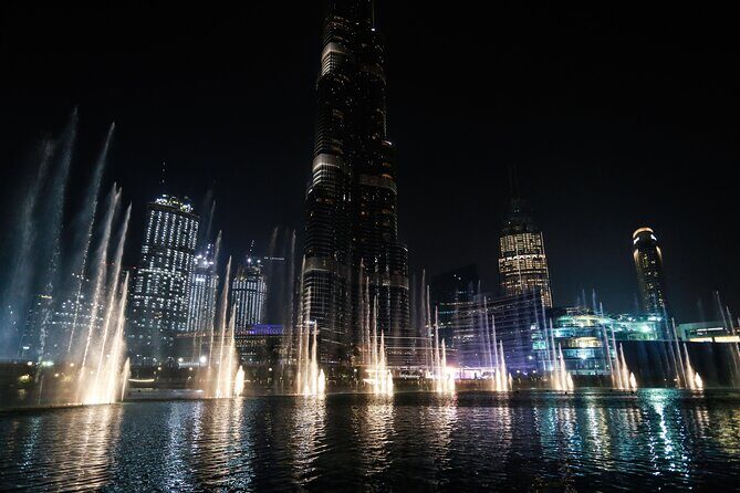 Traditional Abra Ride and Dubai Fountain Show at Burj Lake - A traditional abra on Burj Lake: what that changes