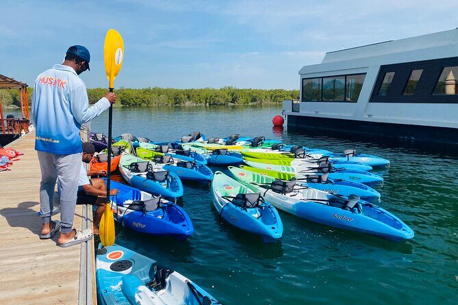 Two Hours Guided Kayaking Tour Reem Central Park Abu Dhabi - Beach stop time: swim, photos, and the potential for a surf lesson
