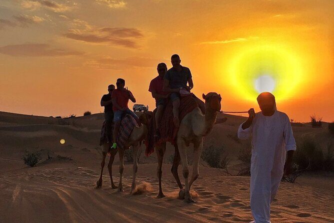 Ultimate Desert Experience Quad Bike, Sandboarding, Camel Ride - Private Table Service Upgrade: When VIP Seats Matter