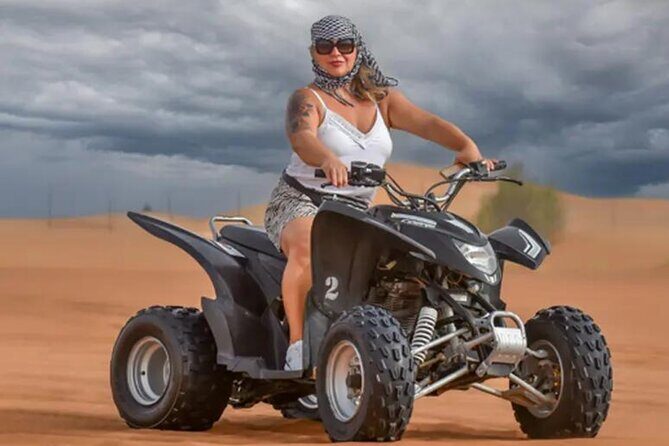 VIP Desert Safari, ATV, BBQ, Camel Ride, All Exclusive Services - The action block: quad biking, dune bash, sandboarding, and camel time