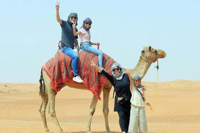 VIP Desert Safari Camel Ride Sand Boarding & BBQ Dinner - Bedouin camp welcome: Kandura/Abaya, tea, and basic comfort