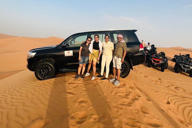 VIP Desert Safari with High Red Dune Bashing & Live BBQ Dinner - Camp Arrival: Arabic Tea, Sweets, Henna, Sheesha, and Falcon Photos