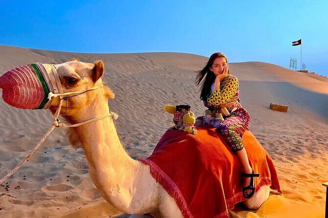 VIP Dubai Desert Safari with Quadbike,Sandboarding & BBQ dinner - Live shows at the camp: Tanura, belly dance, and fire