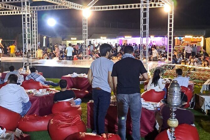 VIP Dubai Desert Safari with Quadbike,Sandboarding & BBQ dinner - BBQ dinner with live entertainment: what’s included and what to watch