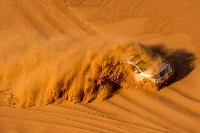VIP Service | Red Dunes Sunset Desert Safari With BBQ Dinner - Dune bashing plus sandboarding: the adrenaline core